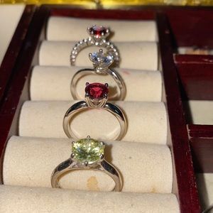 Four rings (NOT REAL DIAMONDS) sold altogether